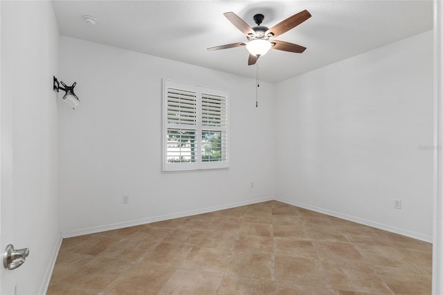7709 SW 86th Ct, Ocala, FL 34481 - empty room with ceiling fan, a smoke detector, and baseboards