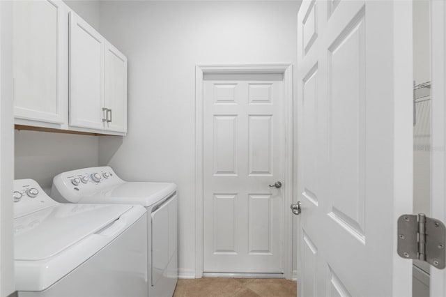 7709 SW 86th Ct, Ocala, FL 34481 - laundry area featuring washing machine and dryer, cabinet space, and light tile patterned floors