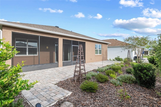 7709 SW 86th Ct, Ocala, FL 34481 - rear view of property featuring a patio and stucco siding