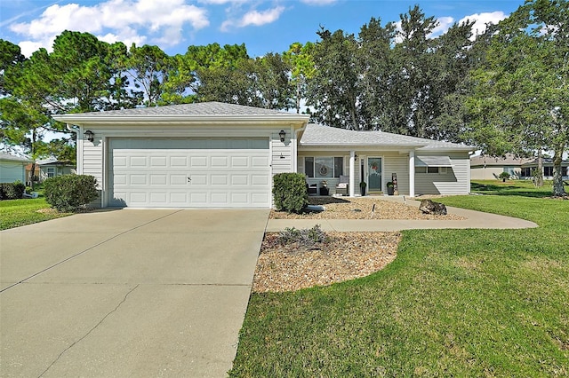 ranch-style house with a garage and a front lawn