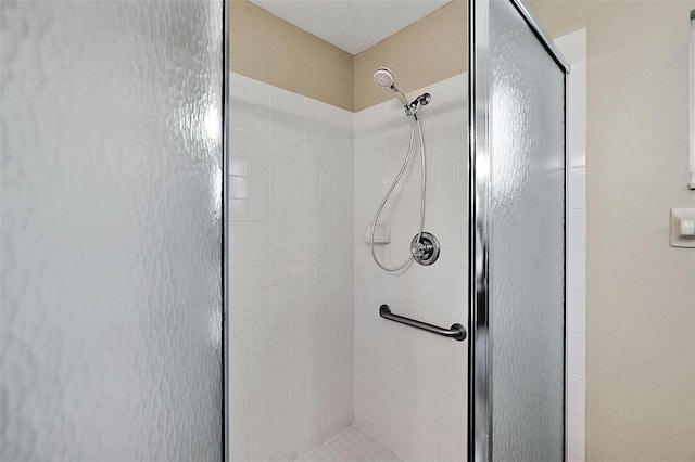 bathroom featuring an enclosed shower