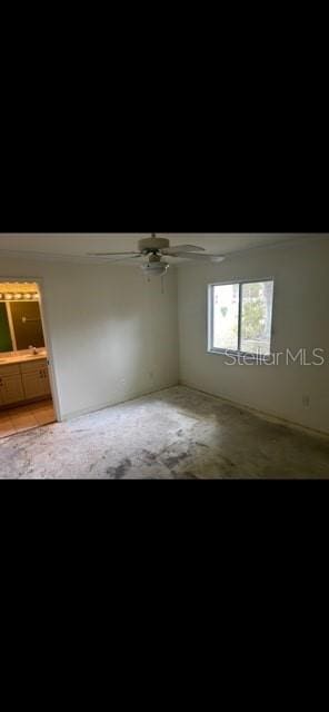 unfurnished room with ceiling fan