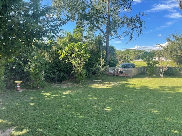 view of yard with fence