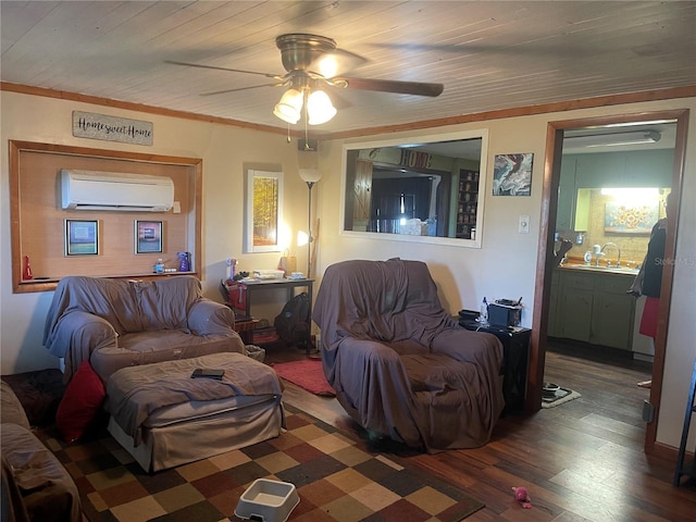living area with crown molding, ceiling fan, a wall unit AC, and wood finished floors