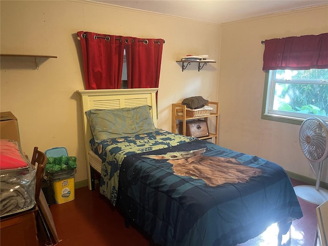 bedroom with wood finished floors