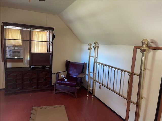 sitting room featuring wood finished floors, vaulted ceiling, and cooling unit