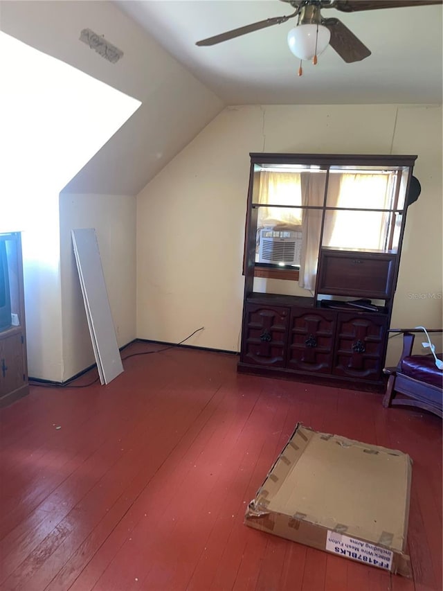 bonus room with wood-type flooring, a ceiling fan, lofted ceiling, and cooling unit