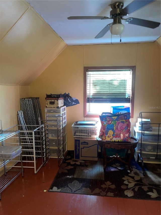 additional living space featuring a ceiling fan, vaulted ceiling, and hardwood / wood-style flooring