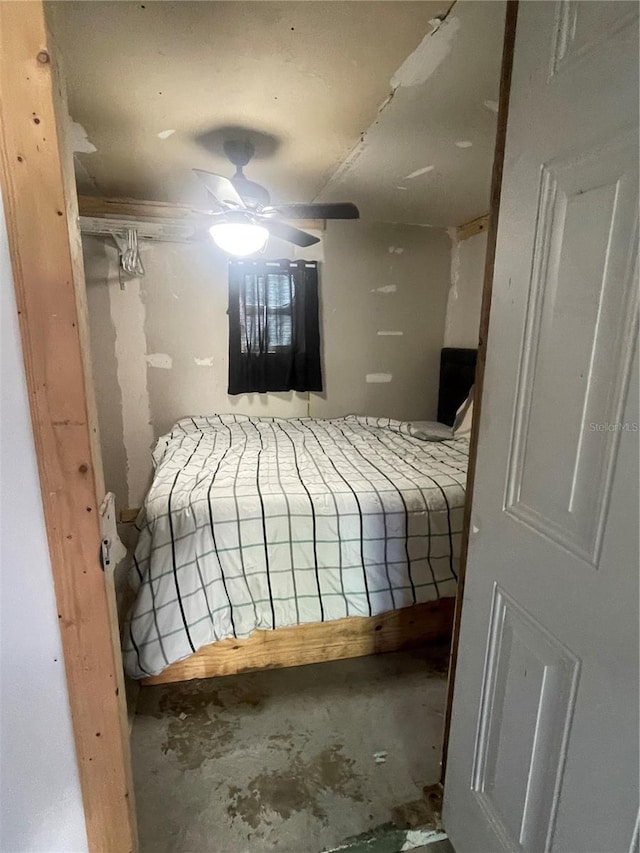 bedroom featuring unfinished concrete floors