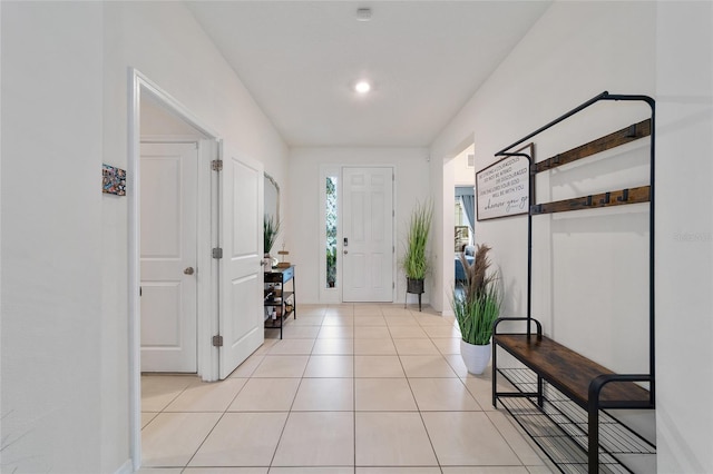 entrance foyer with light tile patterned flooring