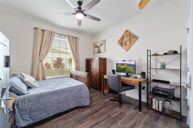 bedroom featuring dark hardwood / wood-style flooring and ceiling fan