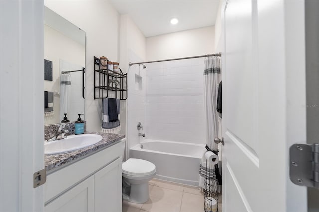 full bathroom featuring tile patterned flooring, shower / bathtub combination with curtain, vanity, and toilet