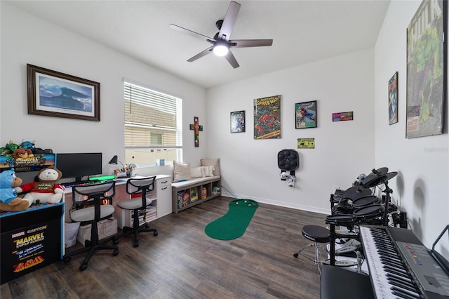 office area with ceiling fan and dark hardwood / wood-style flooring