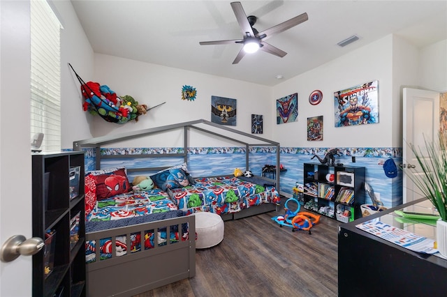 bedroom featuring hardwood / wood-style flooring and ceiling fan