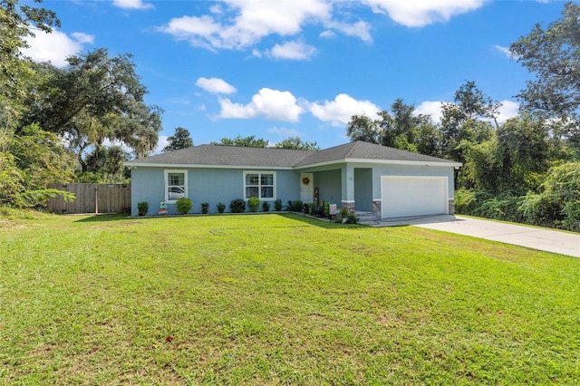 single story home featuring a garage and a front lawn