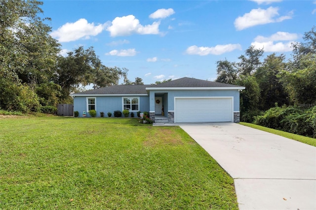 ranch-style house featuring a front lawn and a garage