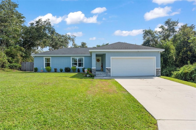 ranch-style home with a garage and a front lawn