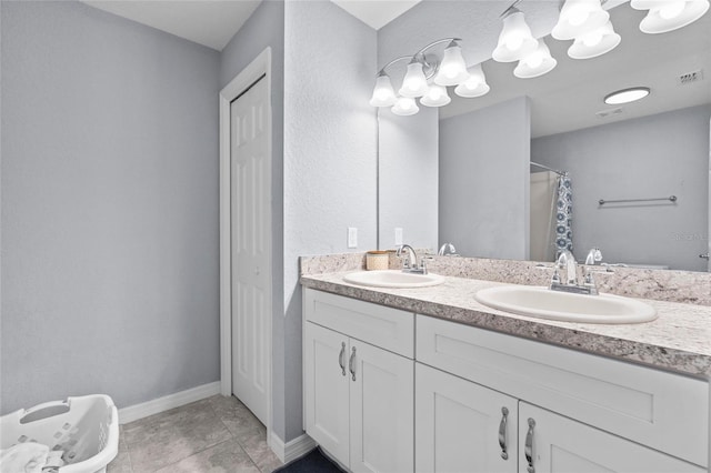 bathroom with vanity, a shower with shower curtain, and tile patterned floors