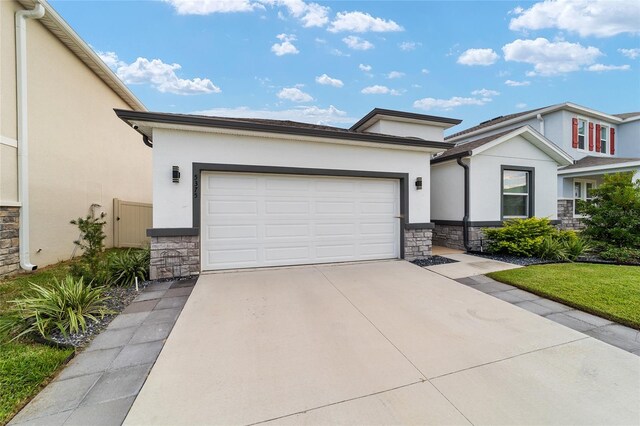 view of front of home with a garage