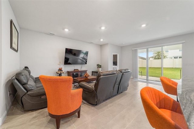 living room with light tile patterned floors