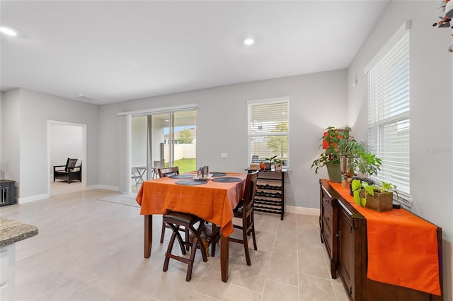 dining room featuring light tile patterned floors