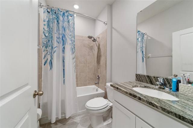 full bathroom featuring shower / bath combination with curtain, vanity, tile patterned flooring, and toilet