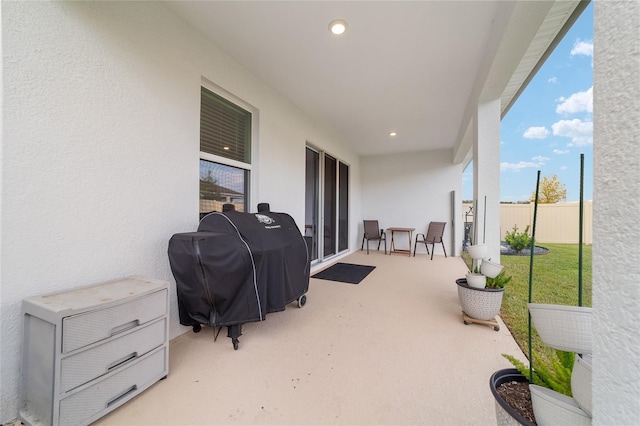 view of patio featuring a grill