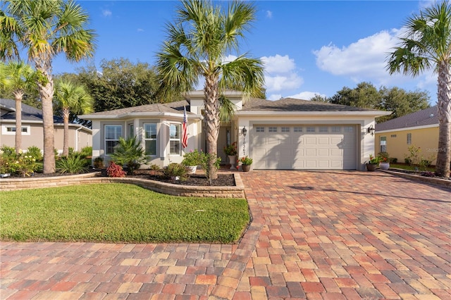 view of front of property with a garage