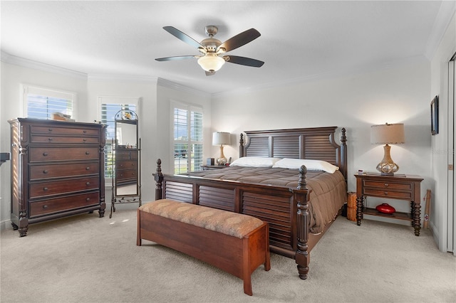 bedroom featuring light carpet, multiple windows, and ceiling fan