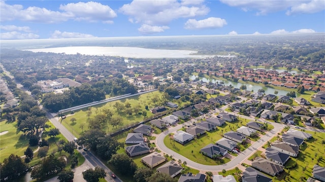 drone / aerial view with a water view