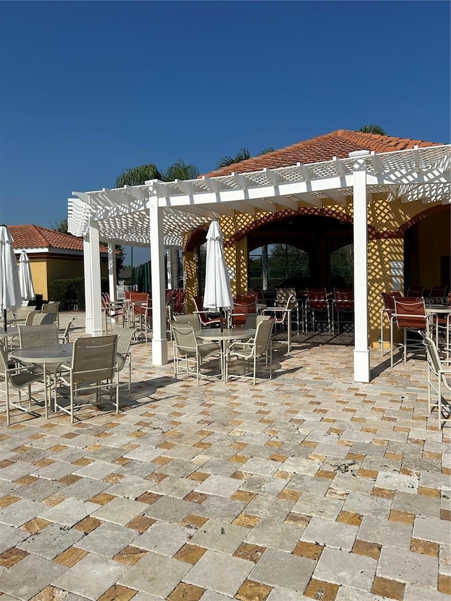 view of patio featuring a pergola