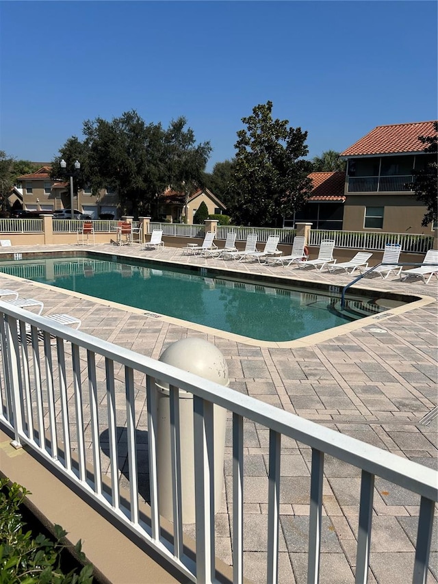 view of pool with a patio