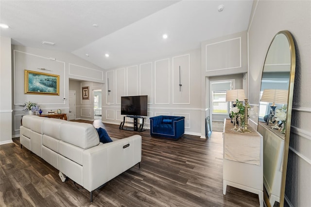 living room with lofted ceiling and dark hardwood / wood-style floors