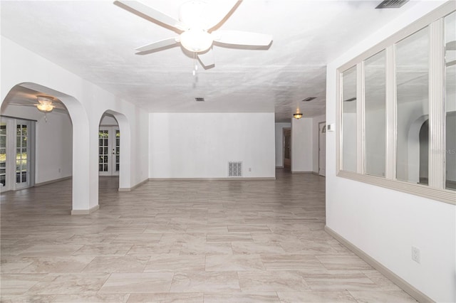 empty room with ceiling fan