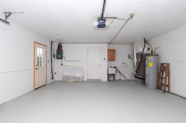 garage with a garage door opener, electric panel, and water heater