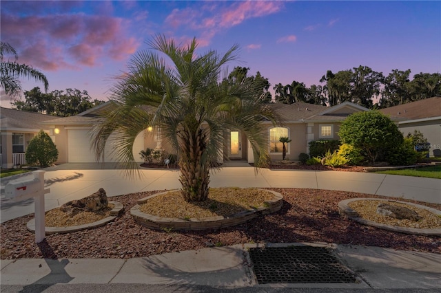 view of front of home featuring a garage