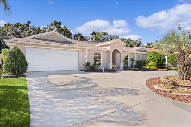 view of front of property with a garage