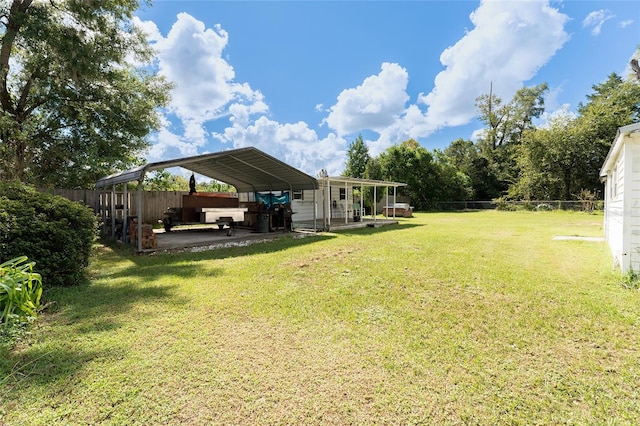 view of yard with a carport