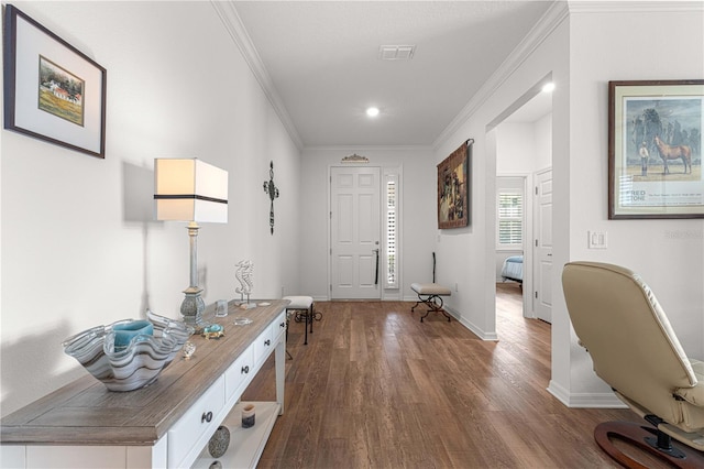 entryway featuring crown molding and dark wood-type flooring