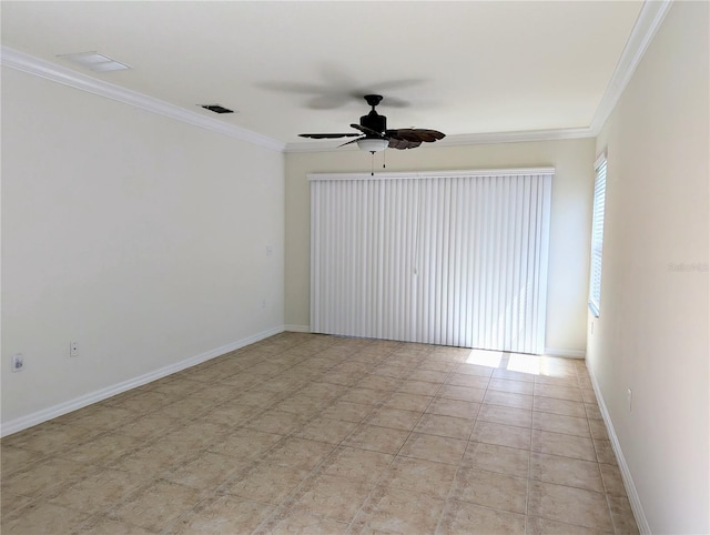 spare room featuring crown molding and ceiling fan