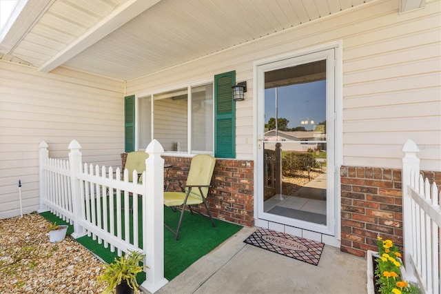 doorway to property with a porch