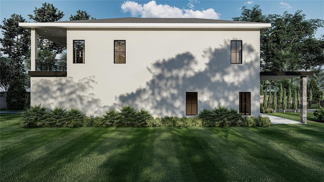 view of side of home with a lawn