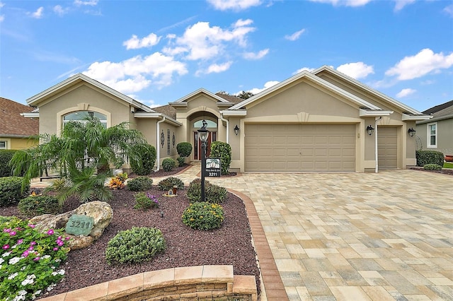 ranch-style home featuring a garage