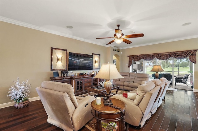 living room with ceiling fan, dark hardwood / wood-style floors, and crown molding