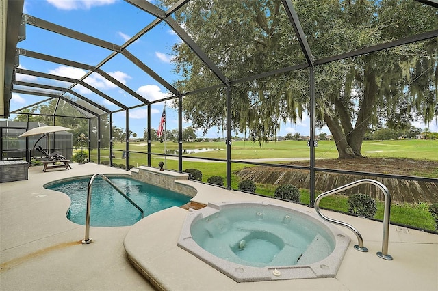 view of swimming pool featuring glass enclosure, an in ground hot tub, a yard, and a patio area