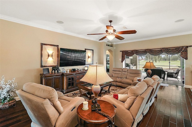 living room with ceiling fan, dark hardwood / wood-style floors, and crown molding