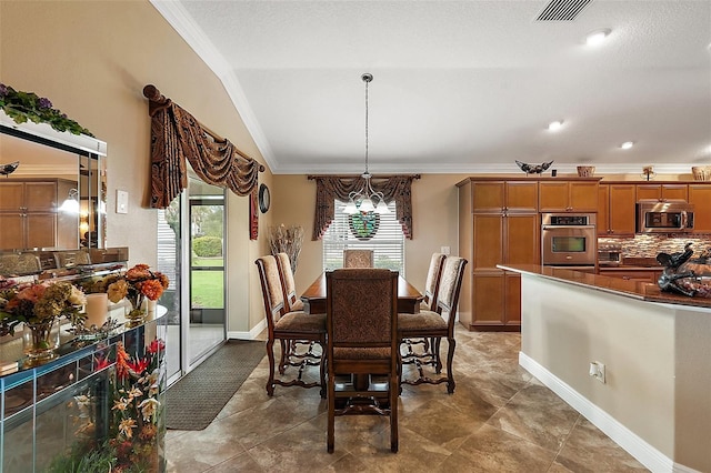 tiled dining area with vaulted ceiling, a chandelier, and ornamental molding