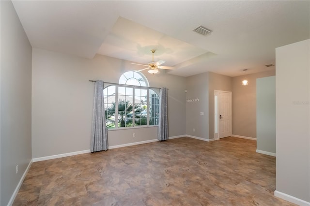 spare room with ceiling fan