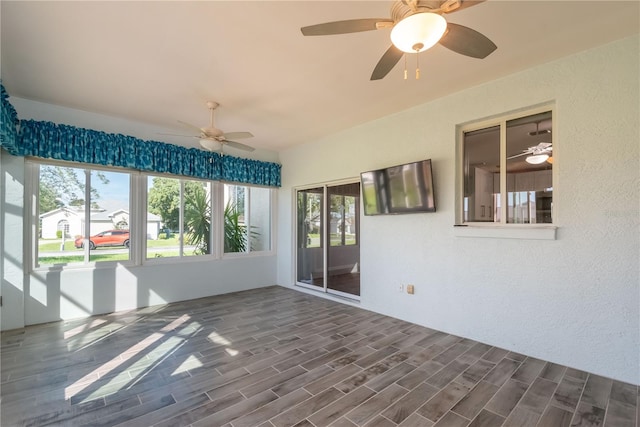 unfurnished sunroom with a wealth of natural light