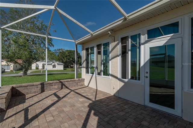 view of patio / terrace with a lanai